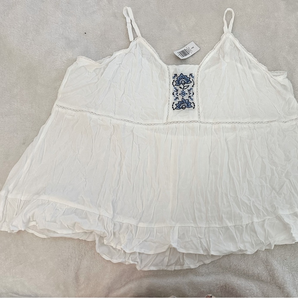 Torrid flowing white top